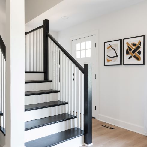 Stairway with contrasting black and white paint scheme