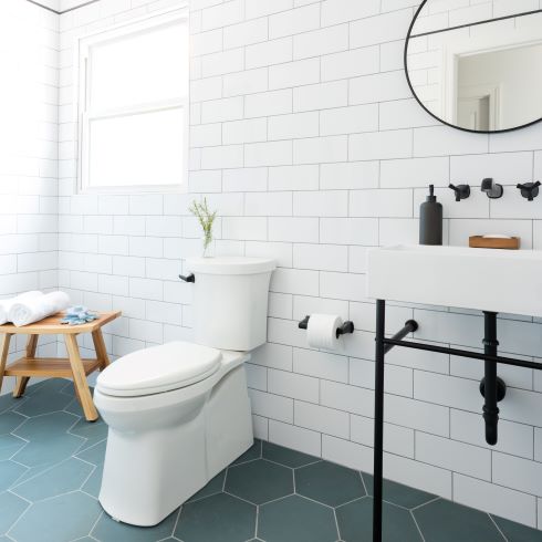 Clean white bathroom with oversized subway tile
