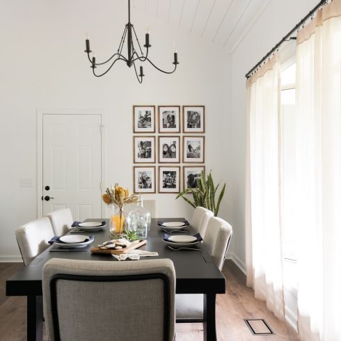 Dining room with stylish gallery feature