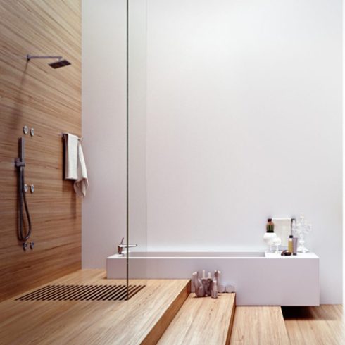 A serene, spa-style bathroom with wooden flooring and large white soaker tub