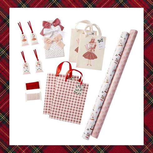 Gift wrap kit bags and paper rolls