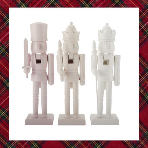 Three white and pink nutcrackers