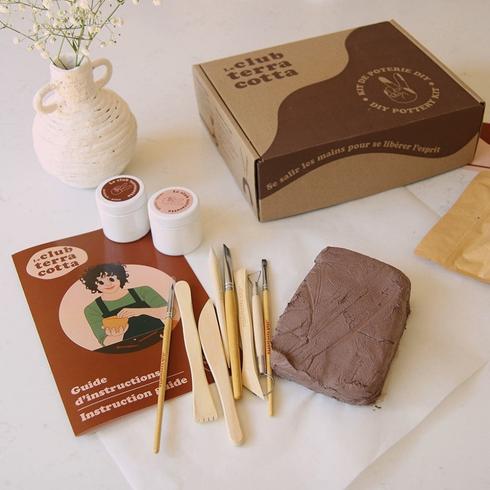 Pottery kit with paint brushes
