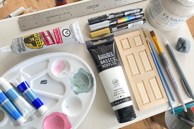 Paint materials for their DIY dollhouse nightstand 
