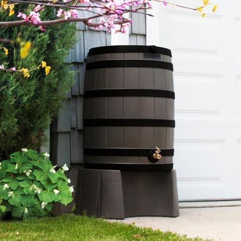 Rain barrel in a backyard of a house