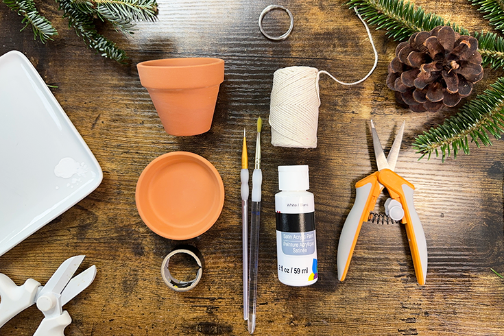 Flat lay shot of required materials on a wood table