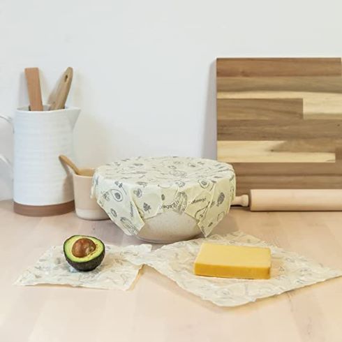 A bowl on a countertop covered with a beeswax wrap