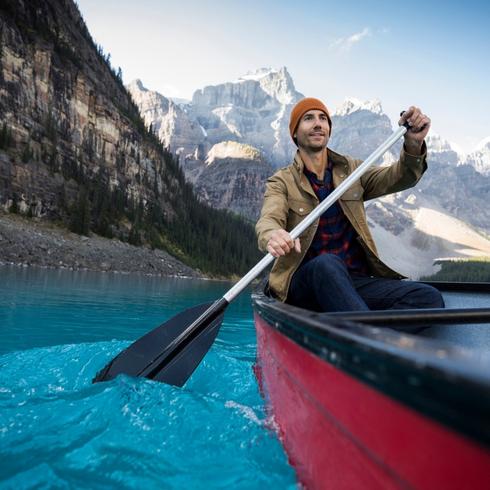 Person rowing on a lake in Banff