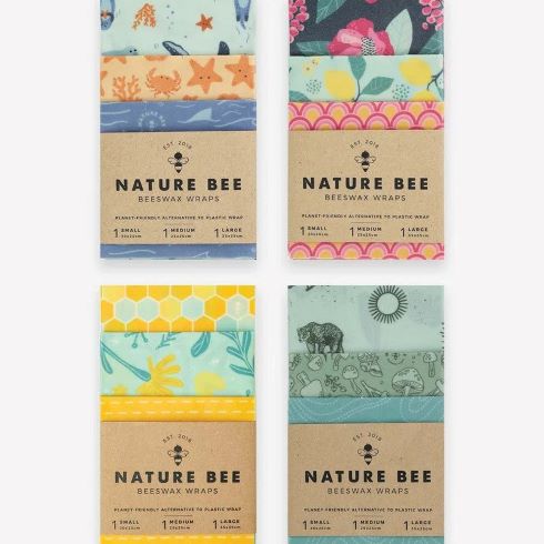Four packages of beeswax wraps with colourful and vibrant designs