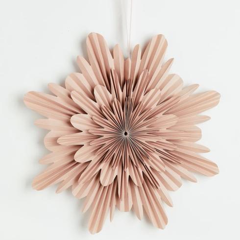 Flower-shaped holiday decoration in paper with a satin ribbon.
