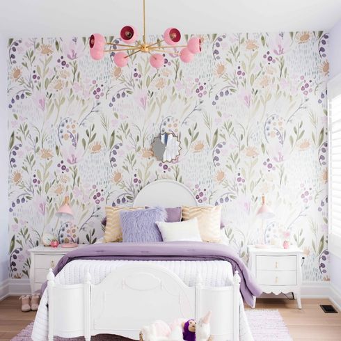 Girl's bedroom with pastel wallpaper