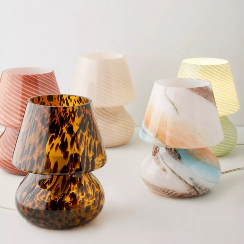 A shot of the Ansel glass mushroom lamp in five colourways