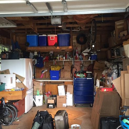A disorganized and dark garage