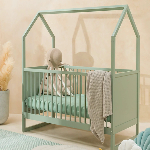 Seafoam House Baby Crib by Coco Village is made of 100% premium pine wood, as well as eco-friendly varnishes and paints, with a large plush octopus inside.