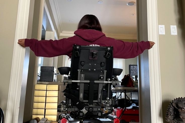 Person showing accessible, wider door frames in their home