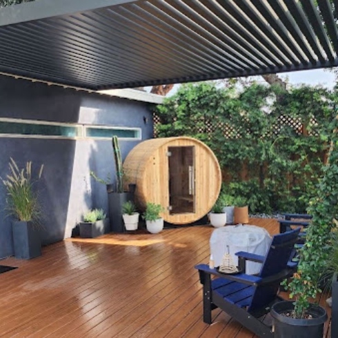 Outdoor barrel sauna as part of backyard wellness trends