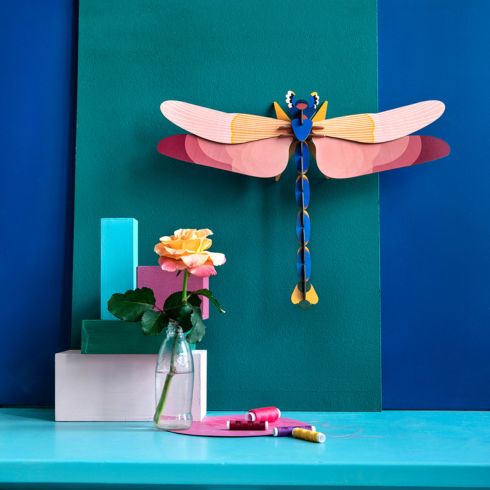Dragonfly on wall in kid's room