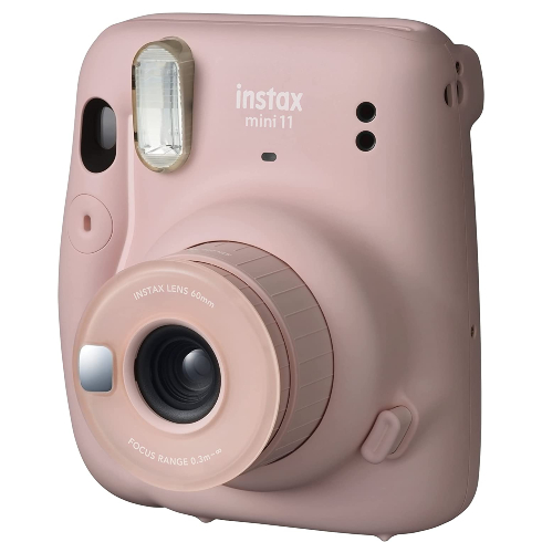 A light rose coloured Fujifilm instant camera