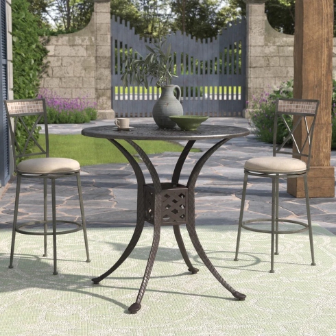 A metal raised-height round bistro-style table