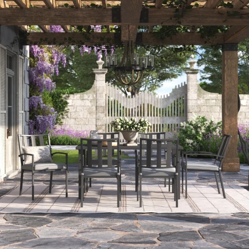 A seven-piece aluminum frame outdoor dining table with six chairs