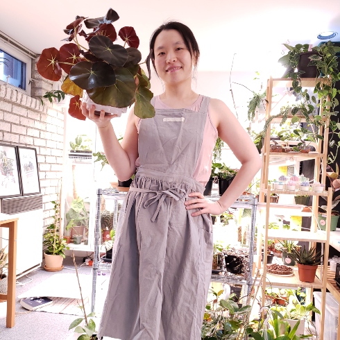 Eloise of PLANTiful Minds holding a rare plant