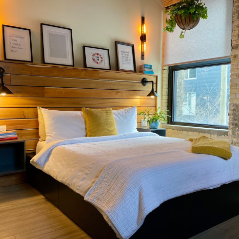 One of the bedrooms in the industrial-style Winnipeg loft