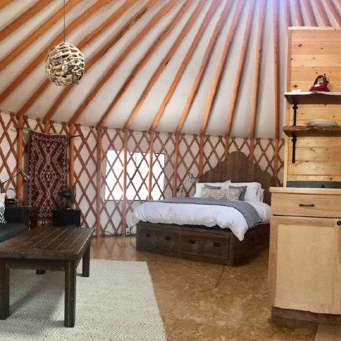 The spacious interior of the luxury yurt