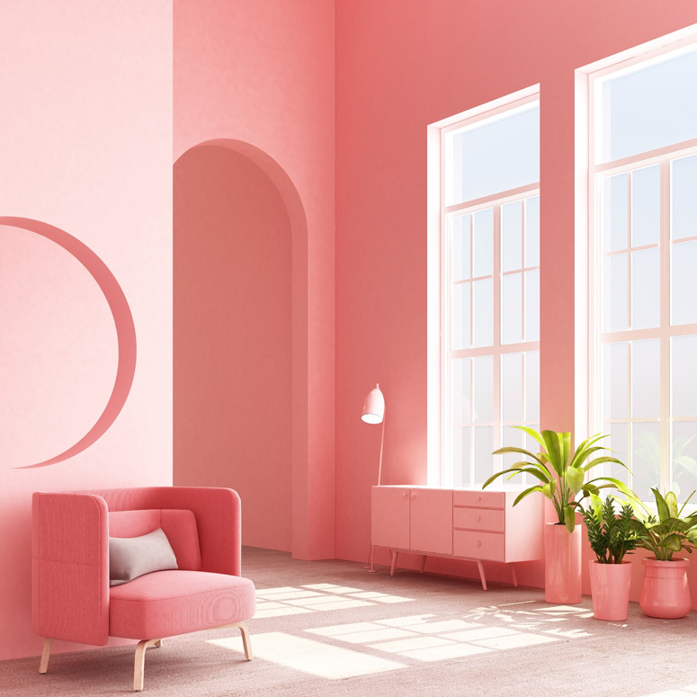 Living room with pink walls, a pink couch and plants in pink pots.