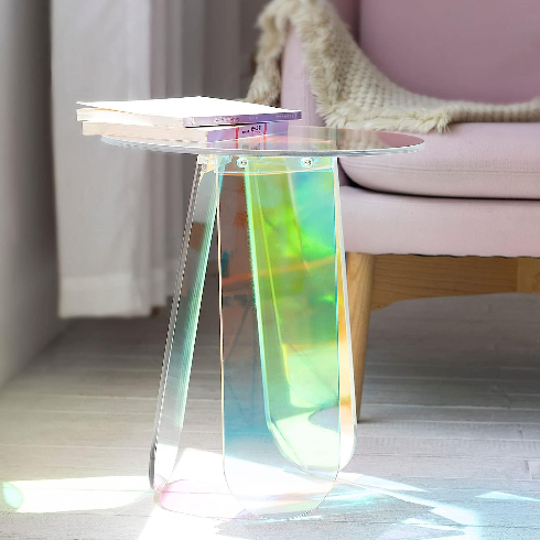 An iridescent rainbow side table