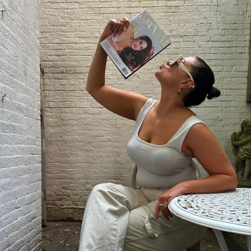 Ashley Graham kissing a magazine