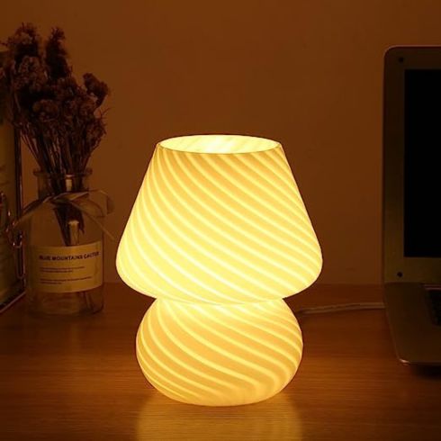 Glass mushroom-style lamp on counter