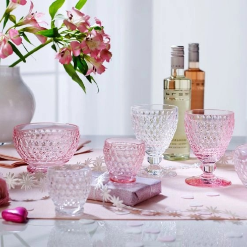 Light and medium pink crystal dessert bowls and champagne glasses