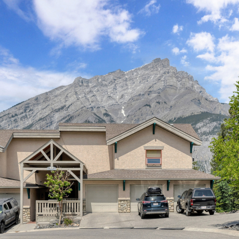 Two-level townhouse in Banff that features panoramic views of an alpine meadow