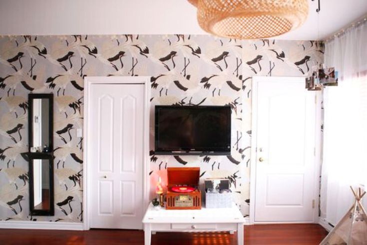 Bedroom with striking heron-print wallpaper from Wallpapers4Beginners on Etsy.