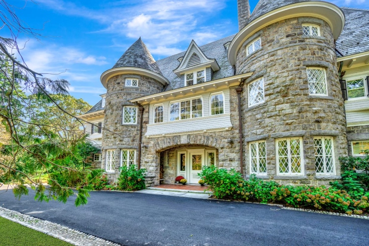 A Victorian-style home with two French Renaissance-style towers