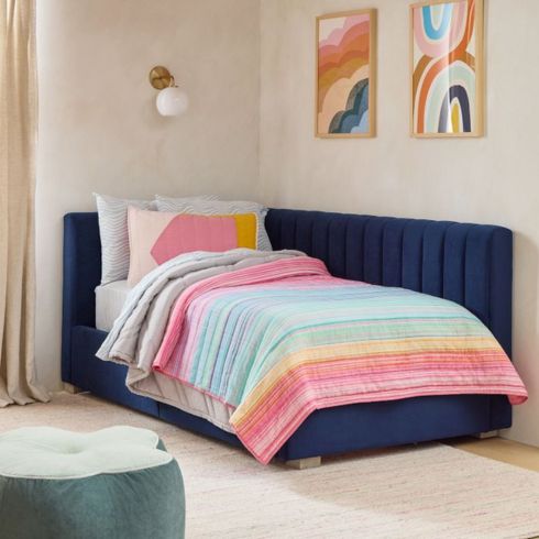 Daybed with pastel duvet and artwork