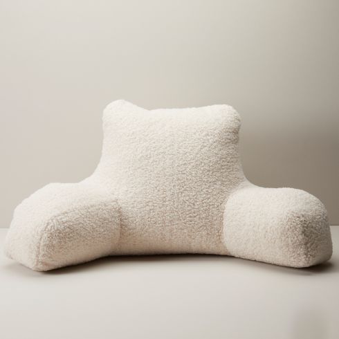 Cream-coloured sherpa pillow