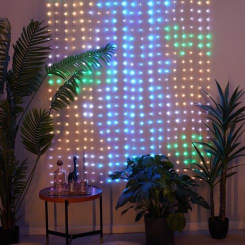 Curtain lights in a room with plants