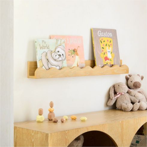 Wooden scalloped floating shelves for kids room