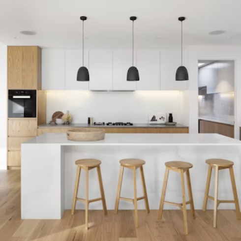 Modern kitchen with island and hanging lights