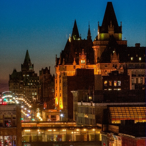 Ottawa's Rideau Street at night, including Château Laurier and Parliament Buildings