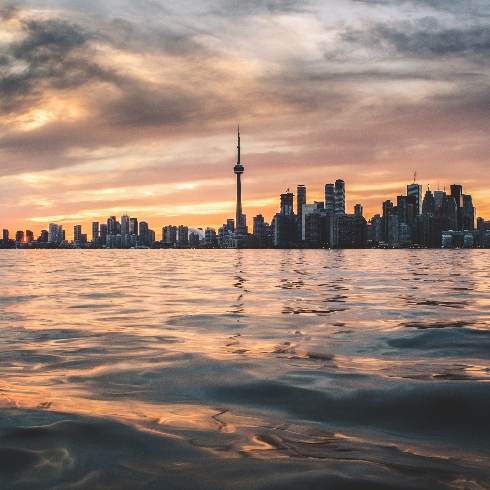 The Toronto skyline viewed from the water at sunset