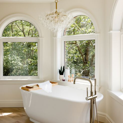Bathroom with arched windows