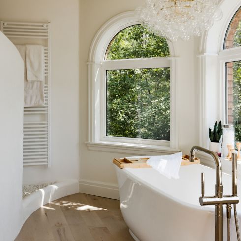 Bathroom with arched windows