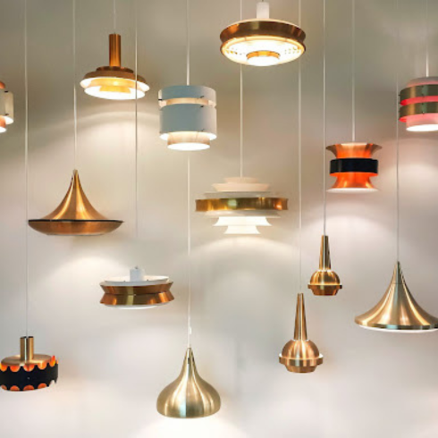 Variety of modern lights hanging from a ceiling