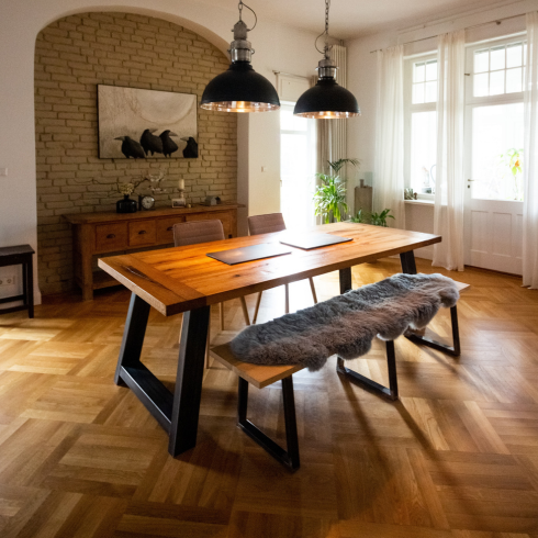 Hardwood floors in a beautiful dining room with lots of wood accents