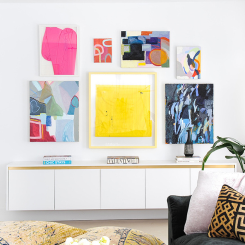 A modern gallery wall with bright colours