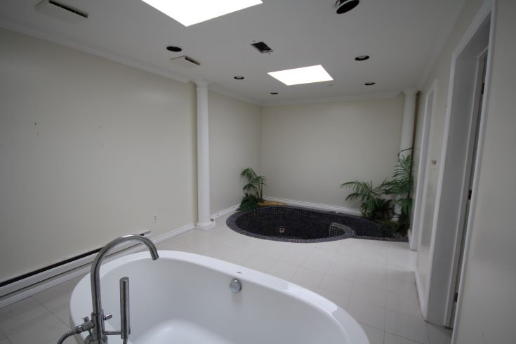 Dated and oversized sunken tub