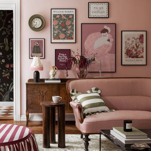 Pink living room with gallery wall