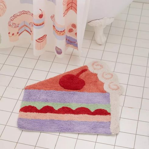 Cake bath mat in bathroom